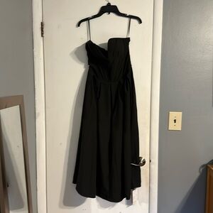 Commense brand black strapless with bonding in bodice and full skirt. Small